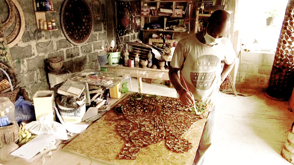 Nigerian sculptor transforms coconut shells into art