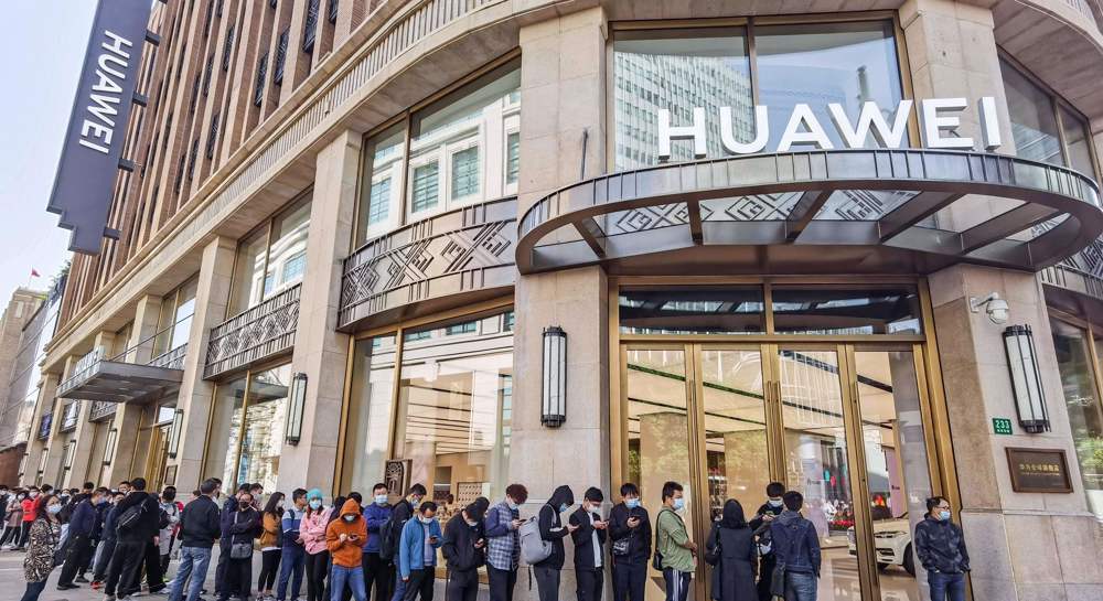 Biden administration adds new limits on Huawei's suppliers