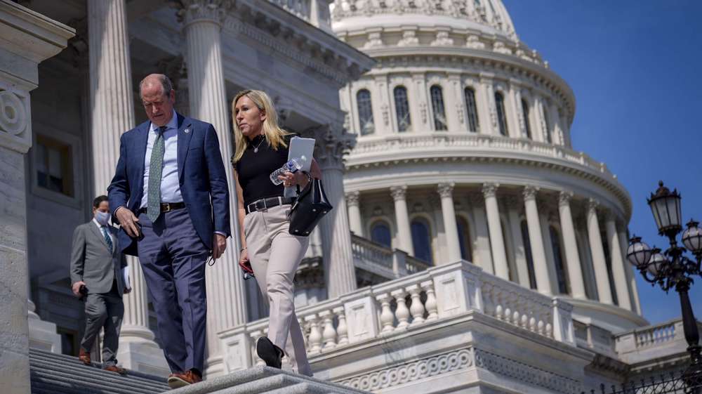 Democrats struggle to expel QAnon backer from Congress