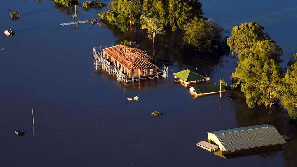 Australia floods claim first fatality, more evacuations as clean-up begins