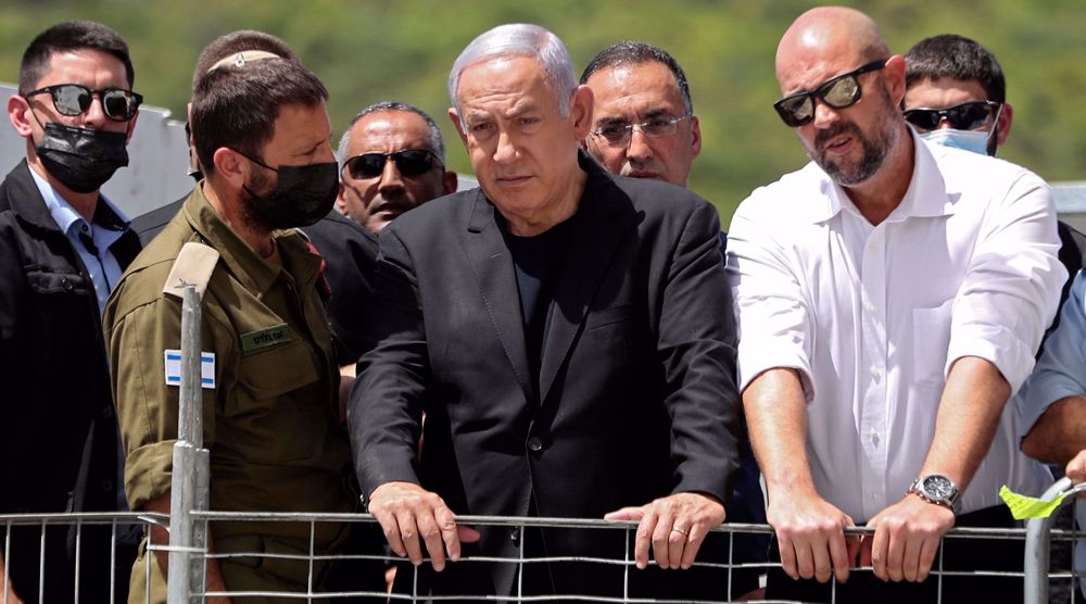 Israel’s Netanyahu booed by protesters at stampede site