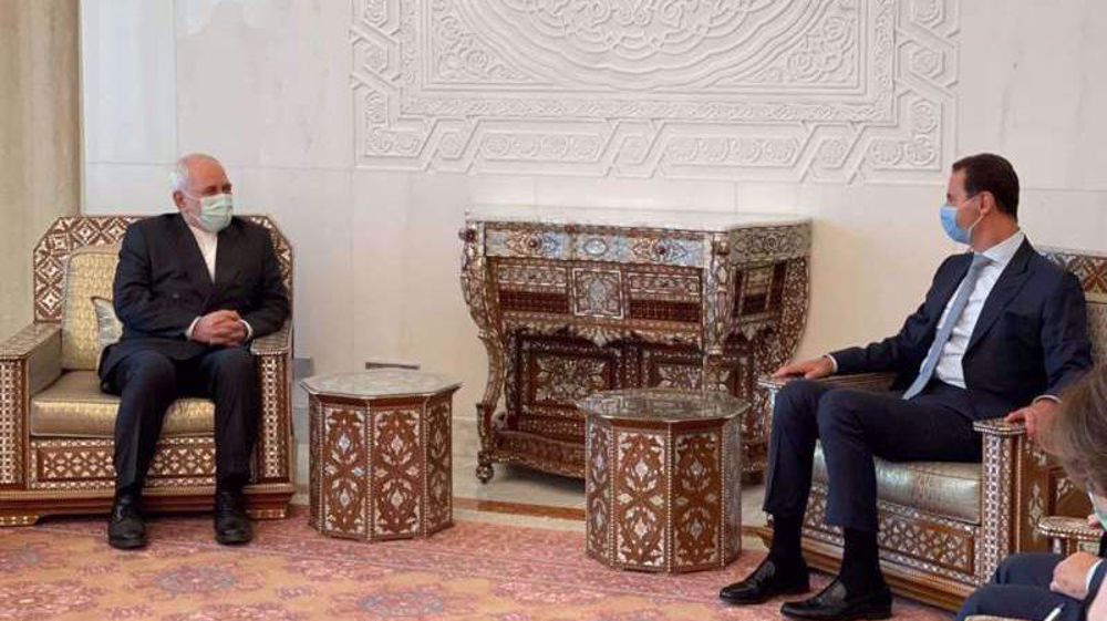 Meeting Assad, Zarif voices Iran's support for Syria presidential election 