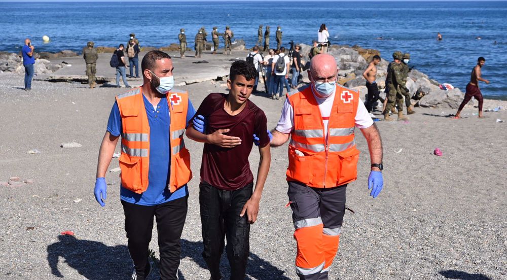 Spain steps up pressure on Morocco after record refugee influx in territory