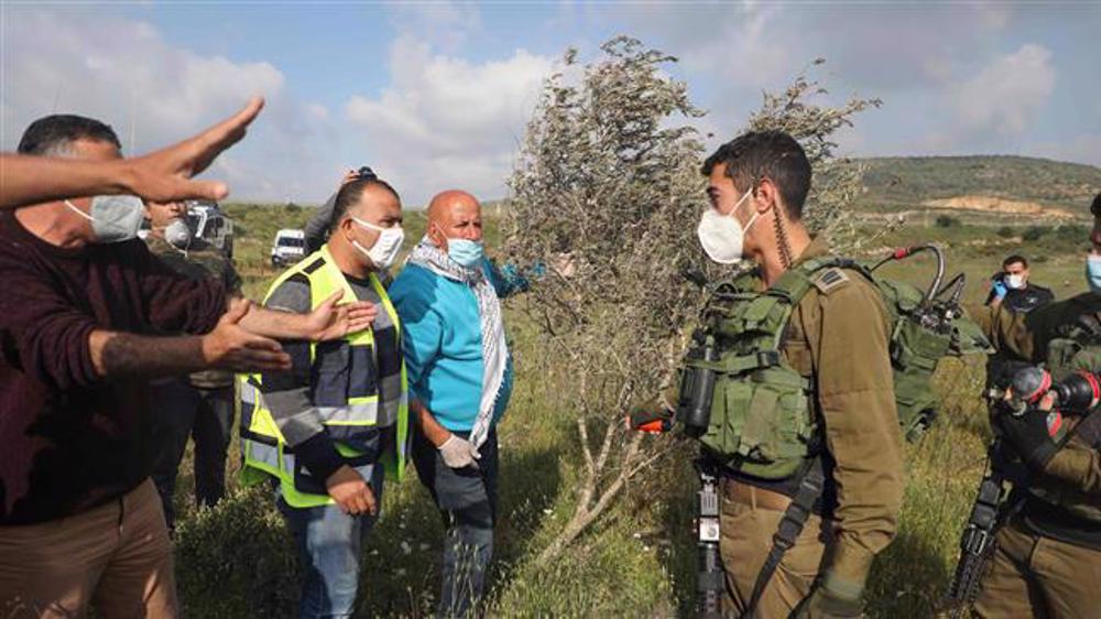 Israeli settlers level tract West Bank land to build new settlement amid rising tensions