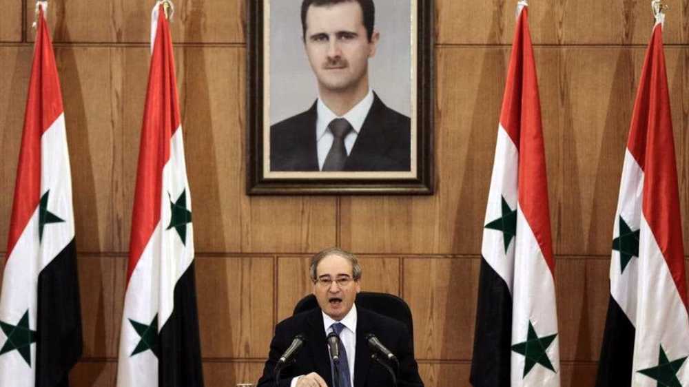 Syria: US plunders our resources, backs terrorists against us