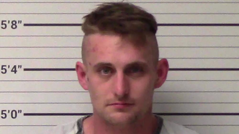 Man arrested over plotting mass shooting in US