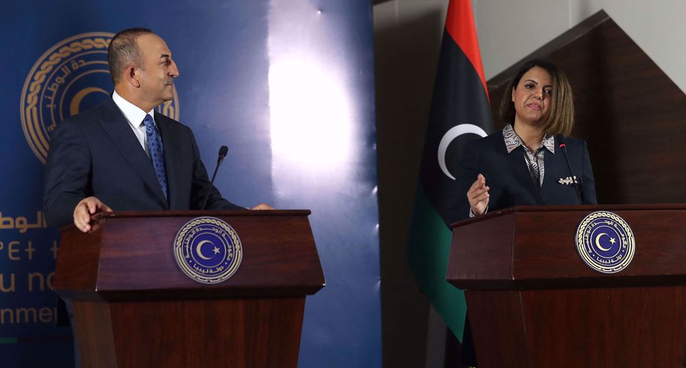 Standing next to top Turkish diplomat, Libyan FM urges departure of foreign forces