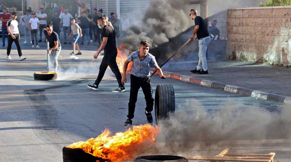 Palestinians protest against flag march in East Jerusalem al-Quds