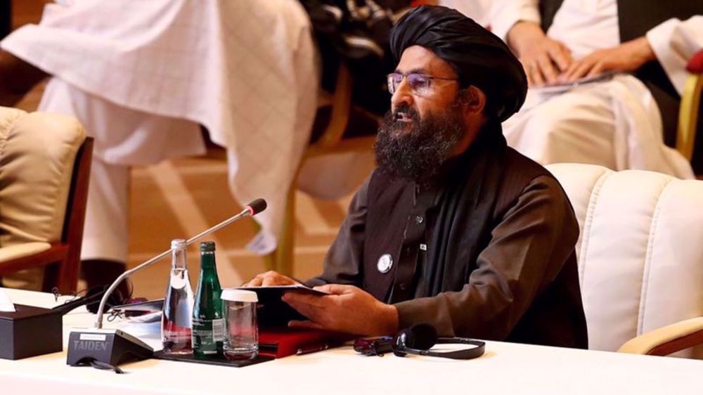 Taliban say committed to Doha talks as Ghani orders security shakeup 