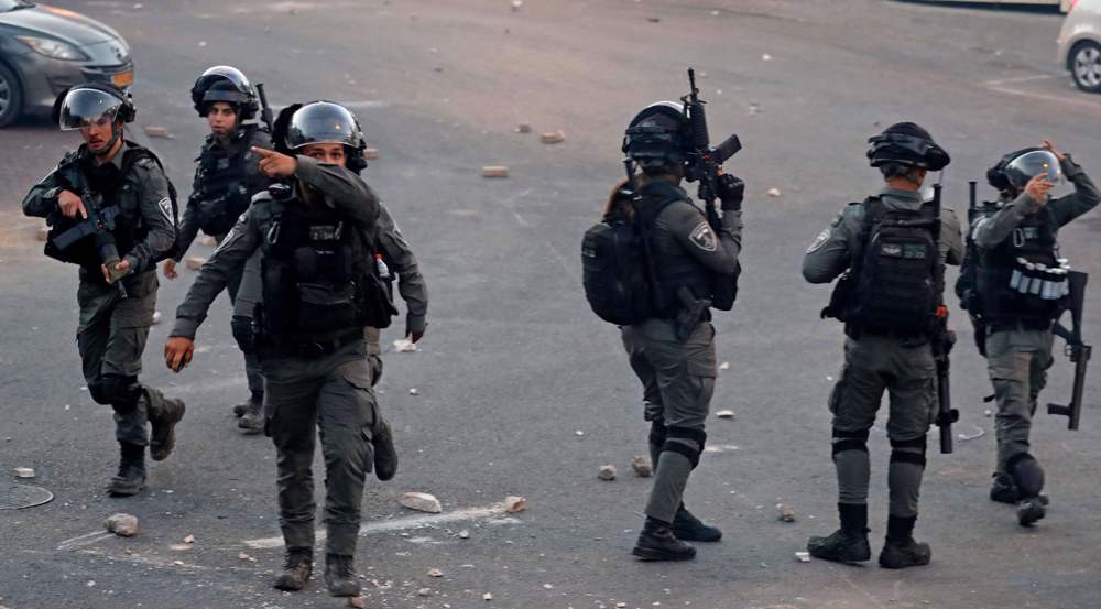 Israeli forces arrest 18 Palestinians in raids across West Bank