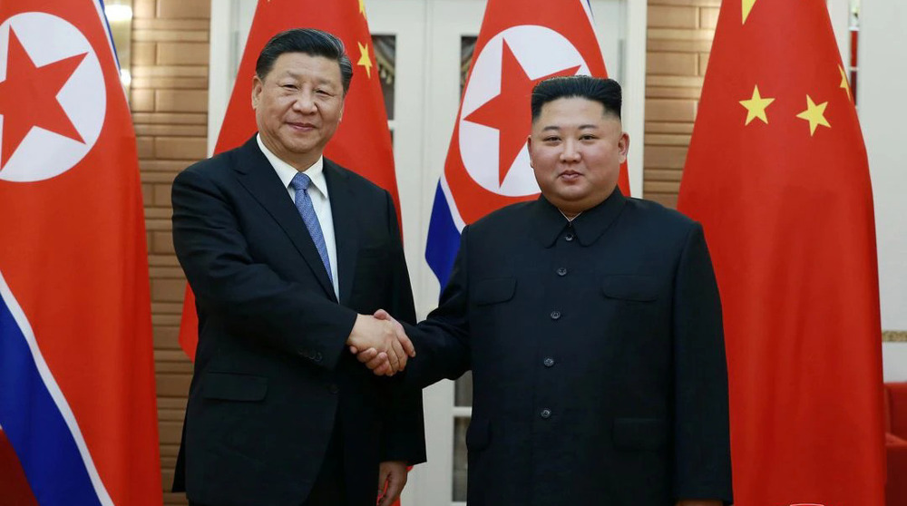 China, North Korea vow to boost ties in face of foreign hostility