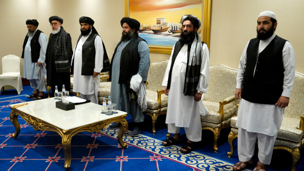 Kabul, Taliban delegates begin talks in Qatar as clashes rage  