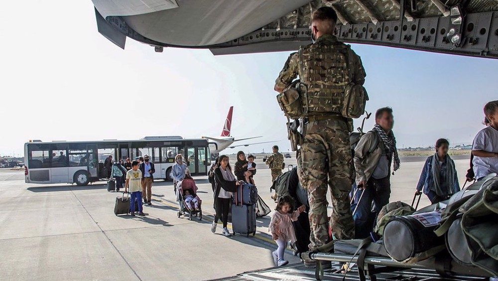 Afghans who guarded British embassy ditched by UK government, daily reports