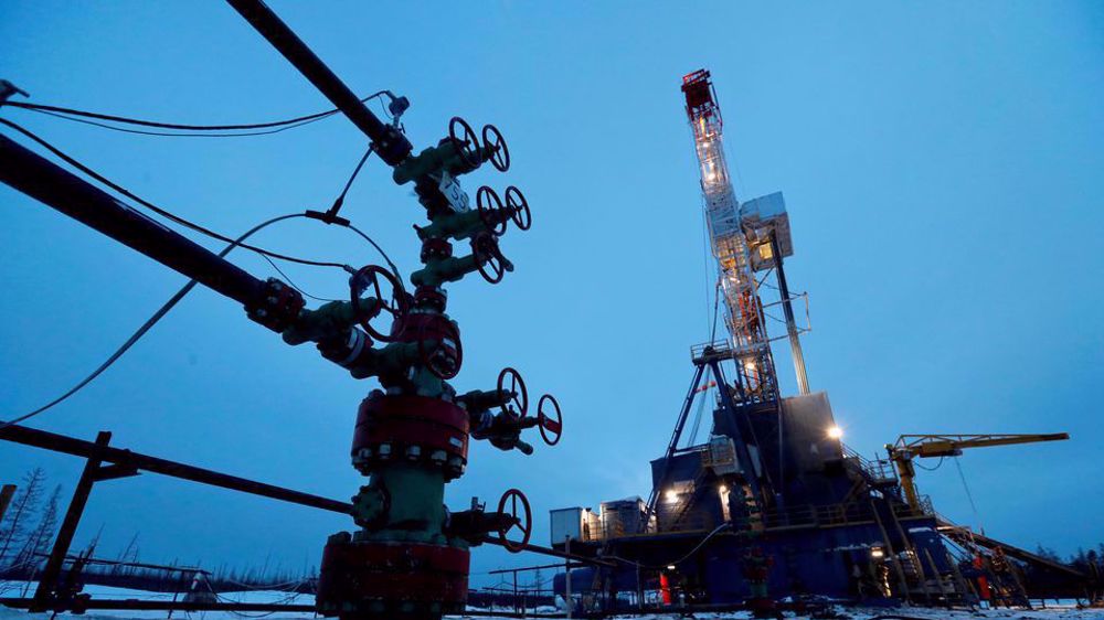 Oil prices snap seven-day losing streak, helped by weaker dollar