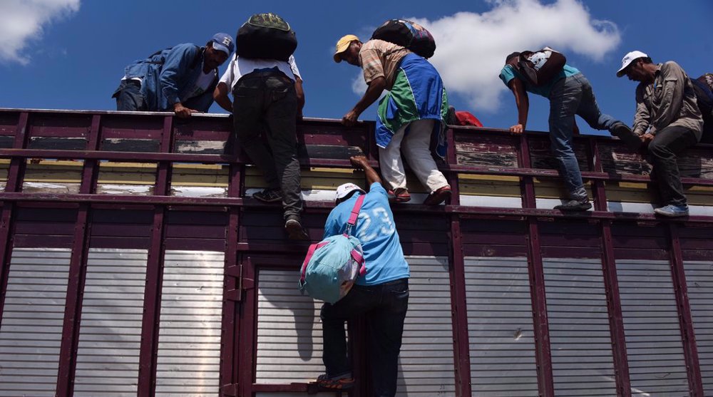 ‘US begins expelling migrant families to south Mexico under Trump-era policy’
