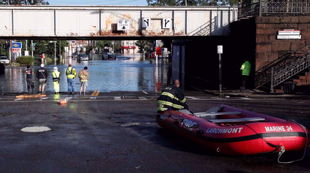 'Historic' New York-area flooding leaves at least 14 dead
