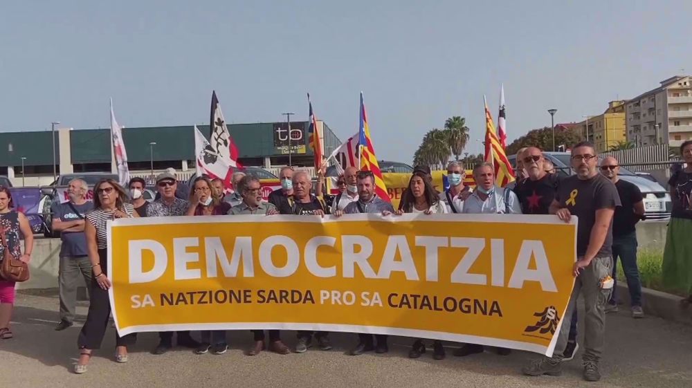 Puigdemont released after his arrest but must stay in Sardinia, say Italian judges