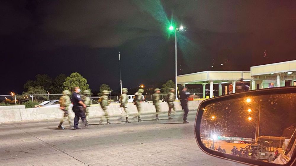 US border agents detain 14 Mexican soldiers in El Paso