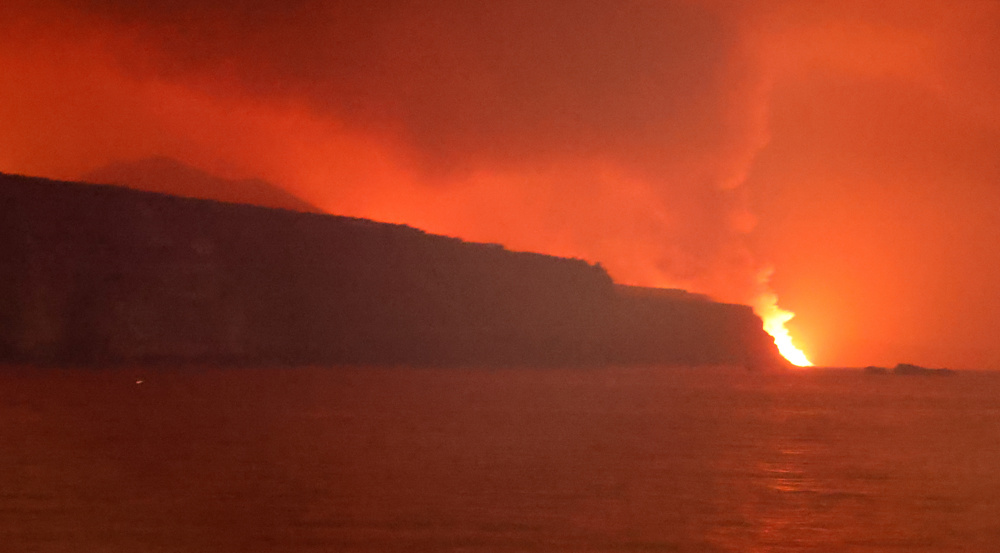 Canaries volcano lava reaches sea, raising toxic gas fears