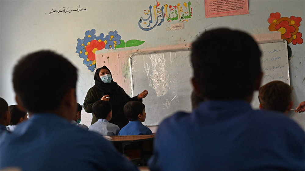 Afghan children return to school in Kabul after Taliban takeover