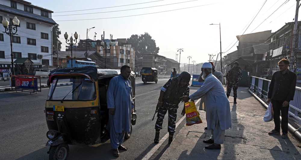 Indian police raid homes of four journalists in Kashmir