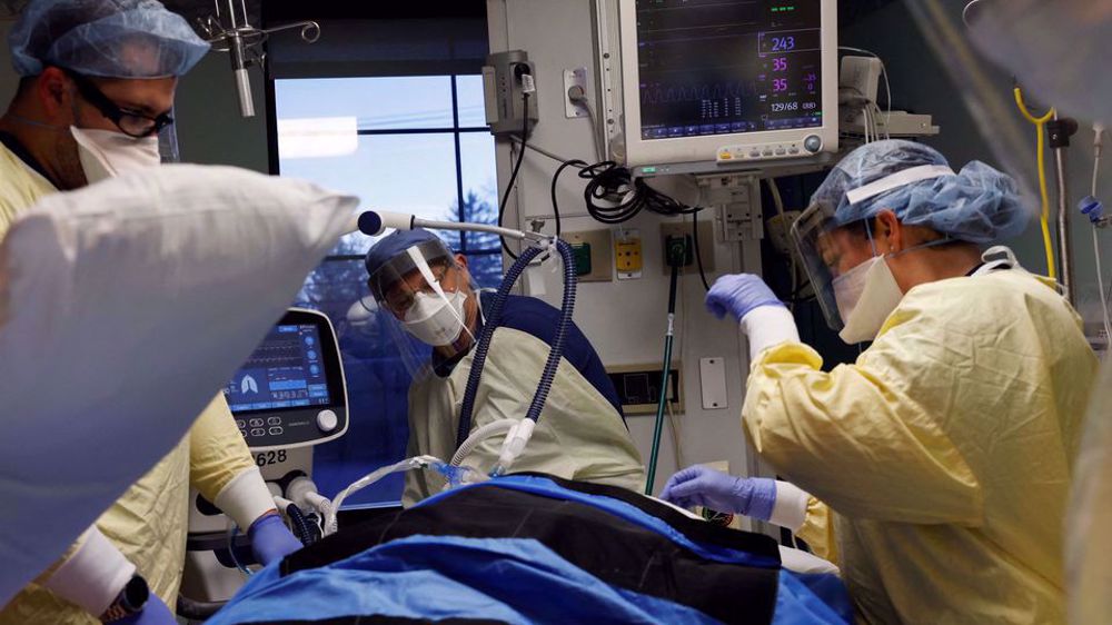 Omicron overwhelms hospitals in early hit cities across US
