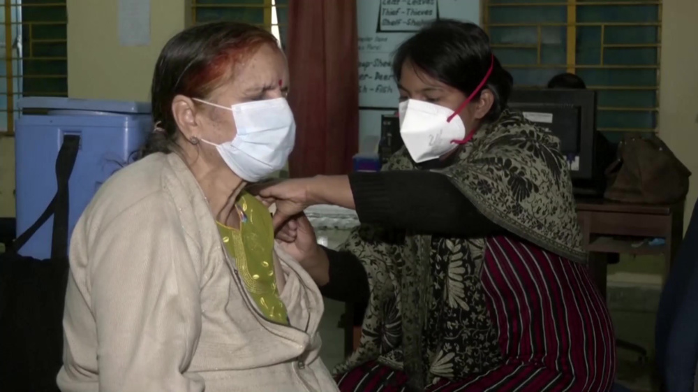India's COVID cases multiply, vulnerable groups given vaccine boosters