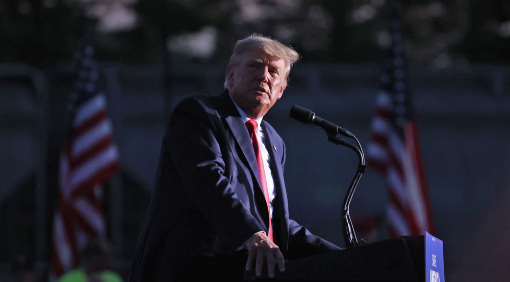 Trump attacks Biden, voices election fraud claims at first rally of 2022