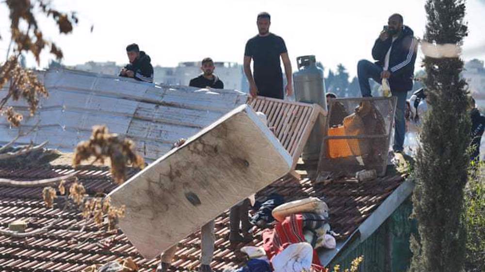 Palestinian man threatens to set home alight over Israel eviction order