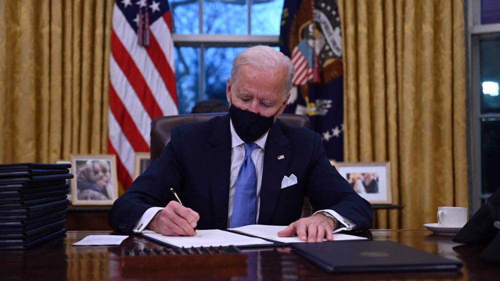 After one year in office, Biden's report card replete with setbacks 