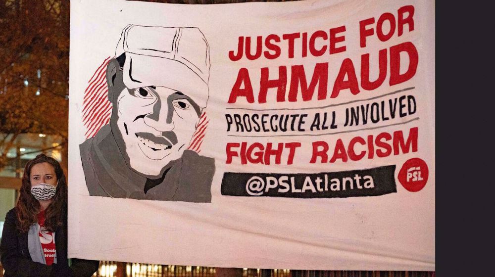 Arbery family in US files racial charges against son's murderers  