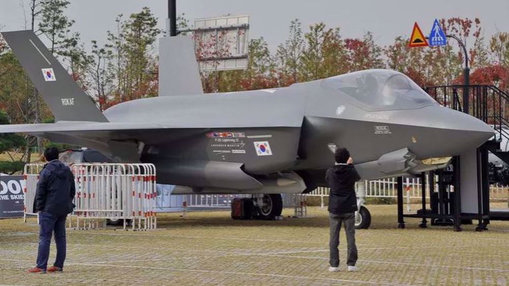 North Korea flies warplanes near border, fires ballistic missile 