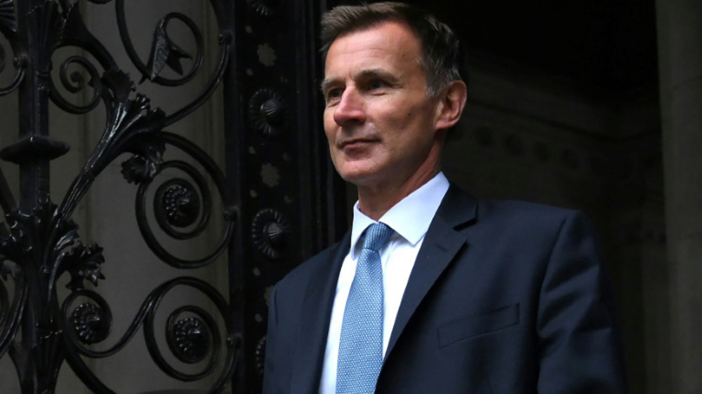 UK's new minister admits 'mistakes', vows tax hikes in humiliating U-turn