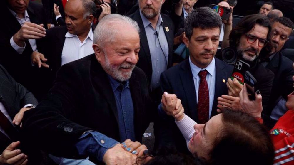 Lula leads opinion polls as Brazil votes in tense presidential contest
