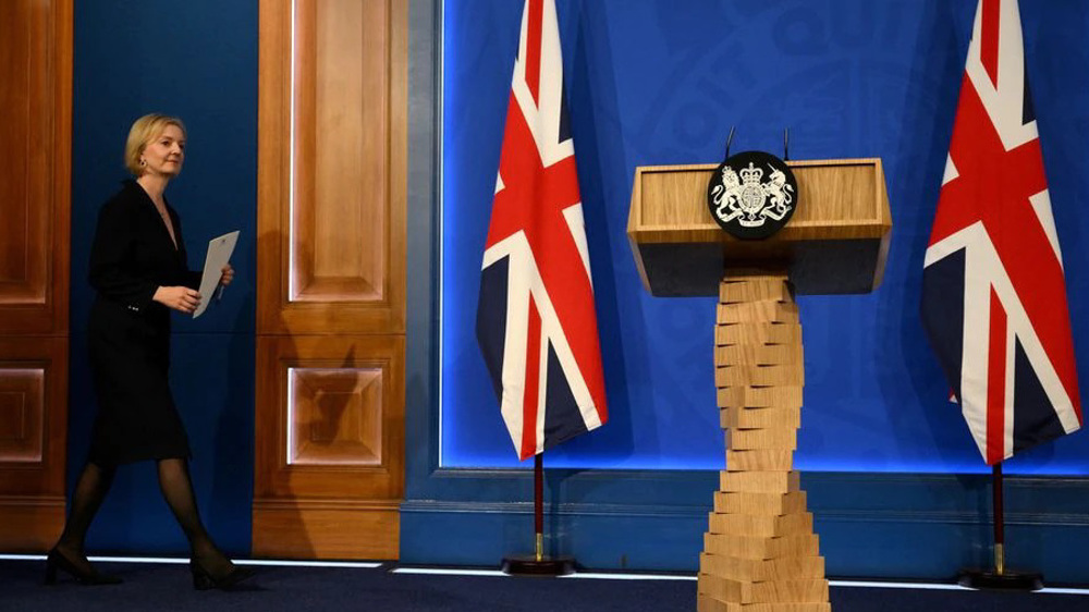 Liz Truss clings to power as chaos in Westminster escalates