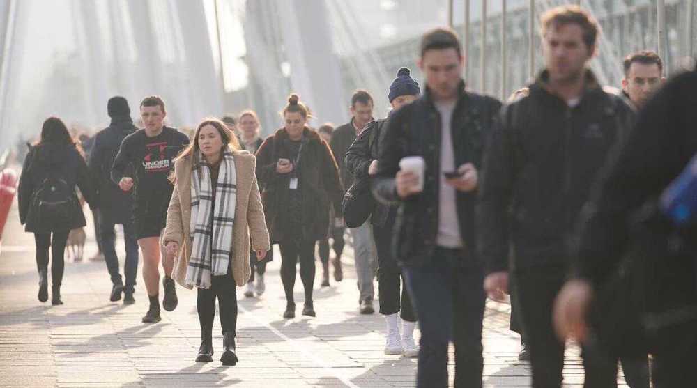 Hit by rising prices, UK shoppers cut spending more than expected
