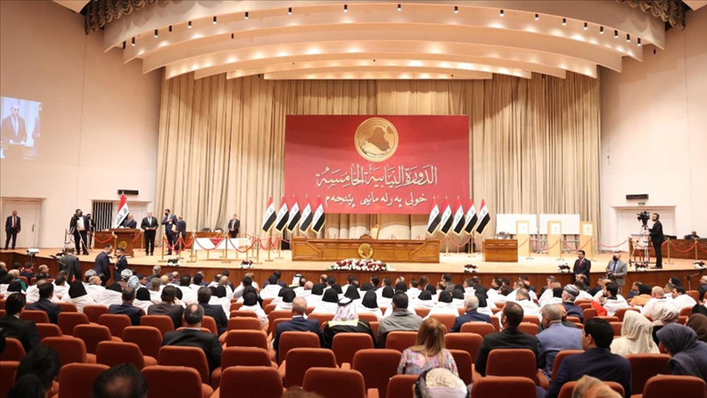 Iraq parliament approves new government, ending year-long deadlock