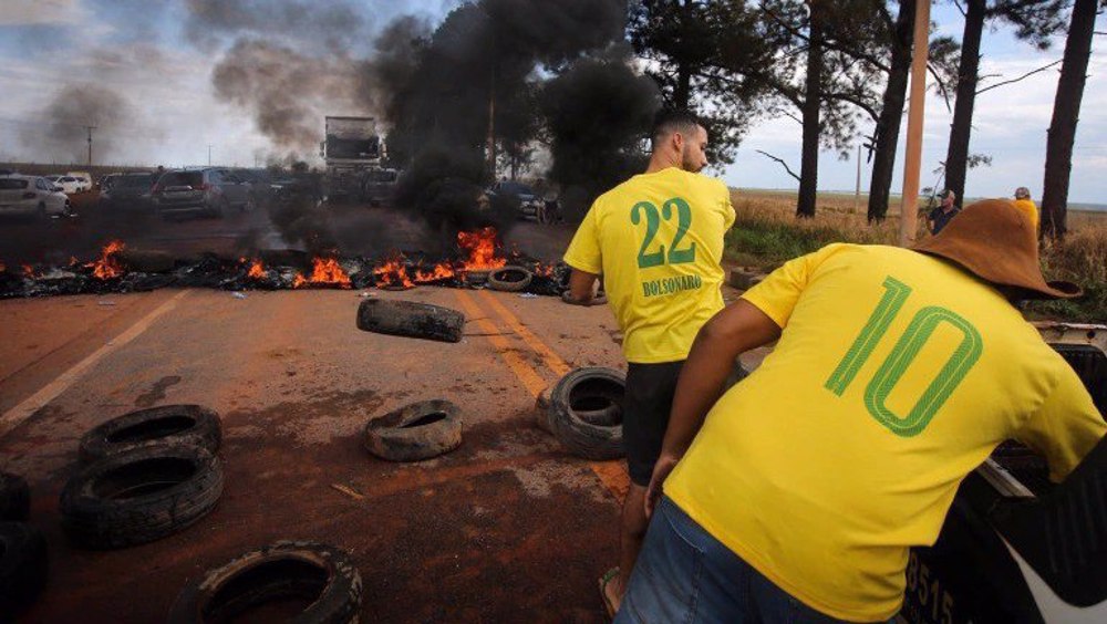 Brazil's top court orders removal of roadblocks by Bolsonaro supporters