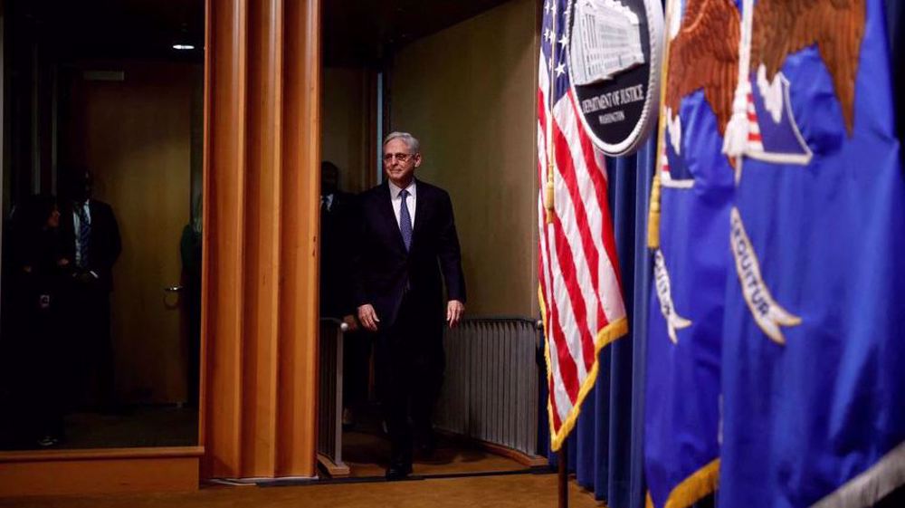 US Justice Dept. names war crimes expert to probe Trump