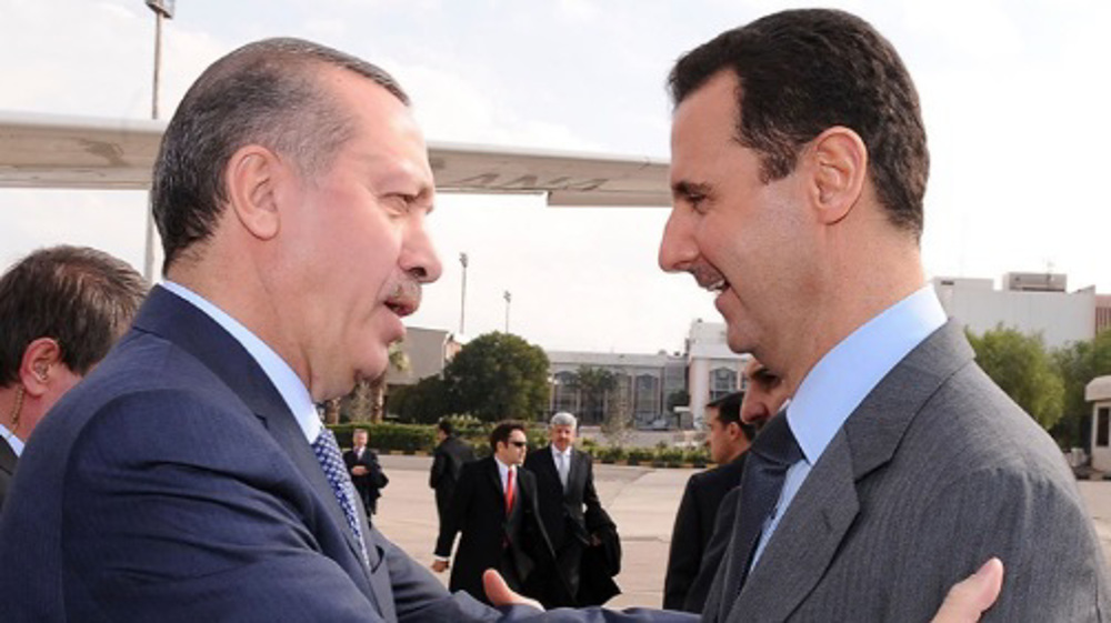 As drums of war beat, Turkey says detente with Syria possible