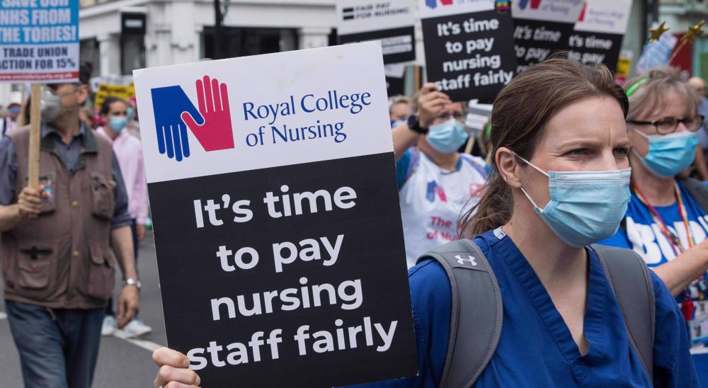 100,000 British nurses begin first ever strike amid dispute over pay