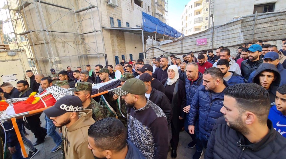 Hundreds of Palestinians mourn teenager killed by Israeli forces in Ramallah 