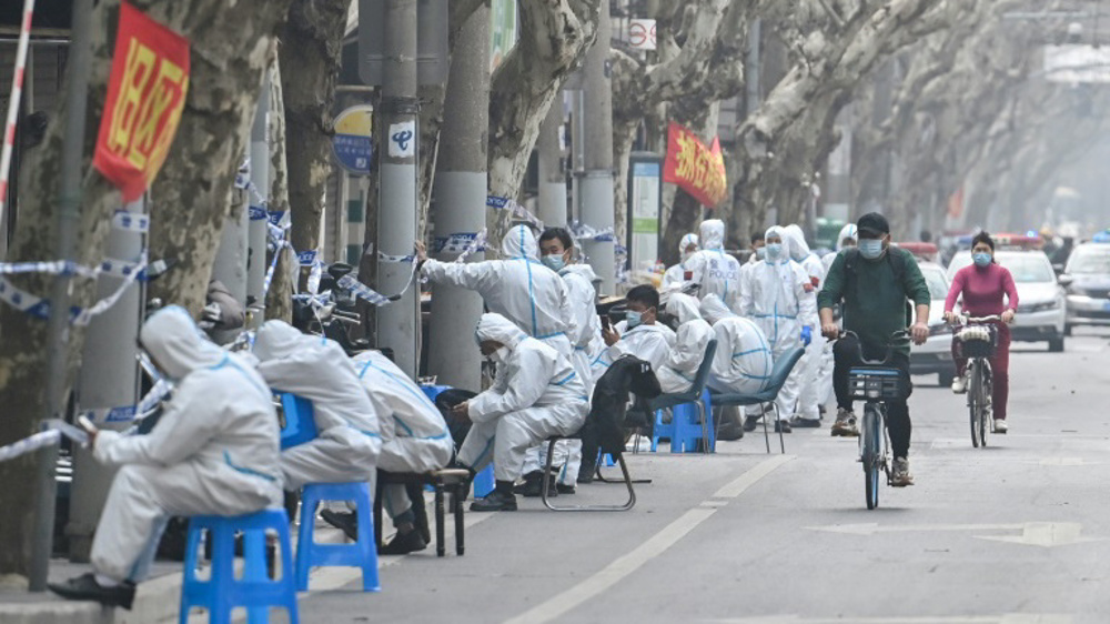 China reports sharp rise in COVID cases