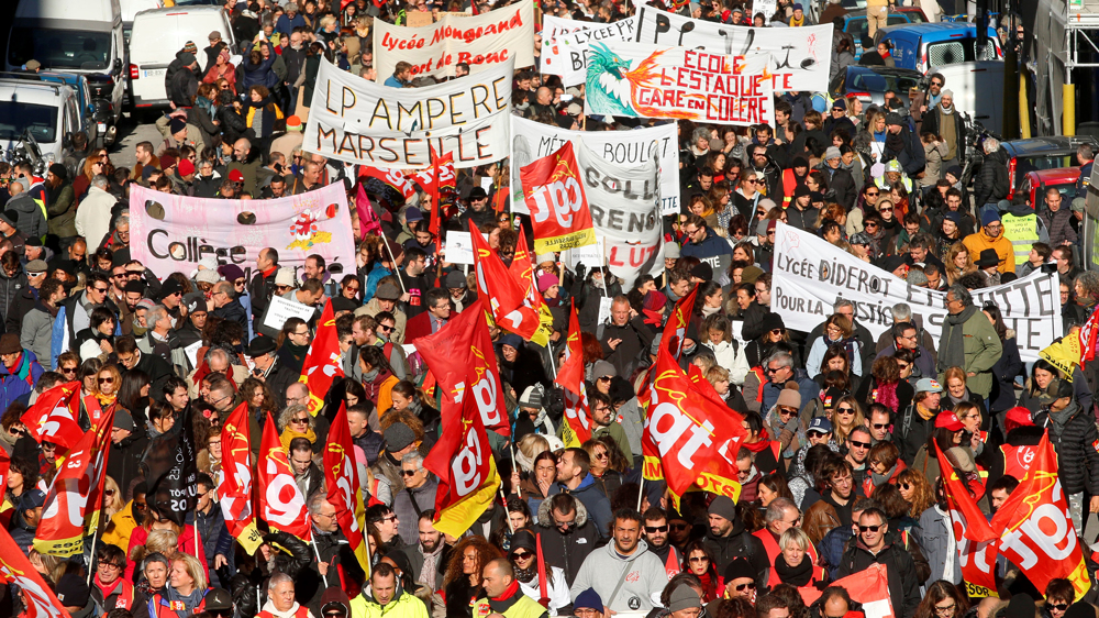 French unions hold nationwide protests against President Macron