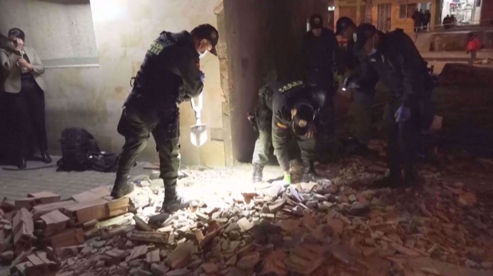 30 people injured, one child dead in attack on police station in Bogota