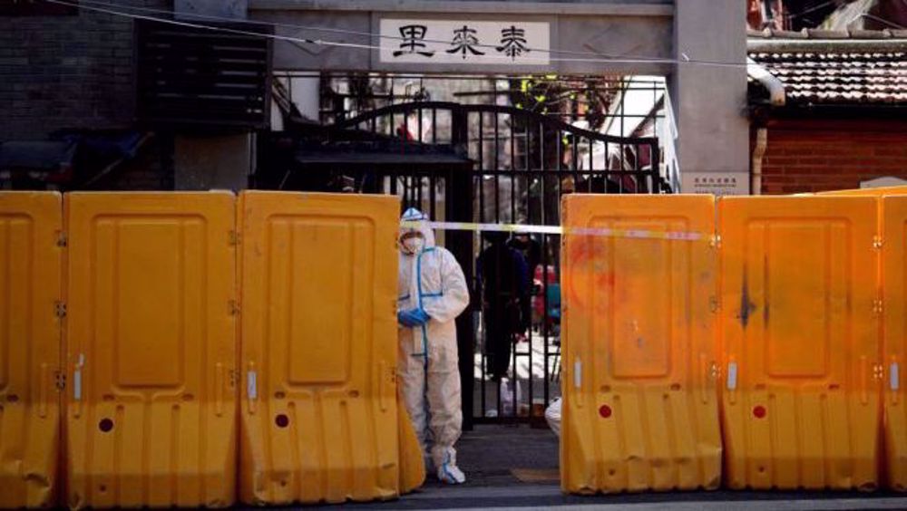 Shanghai extends COVID-19 lockdown as new infections rise above 13,000