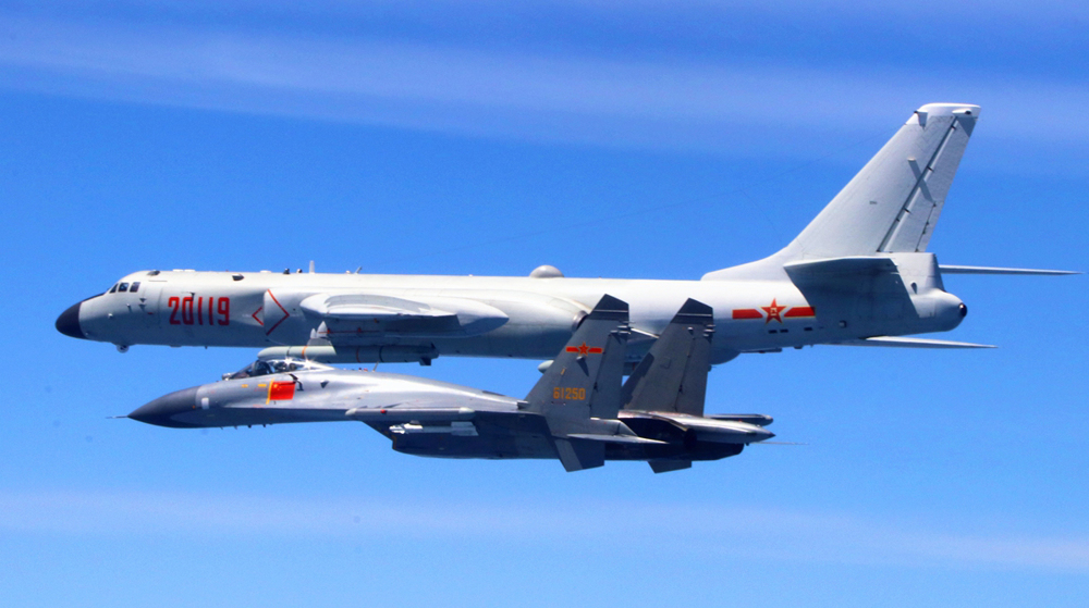 China warns US warship as it transits Taiwan Strait amid tensions
