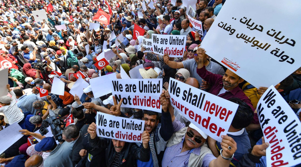 Tunisians call for democratic return after Saied’s seizure of electoral commission