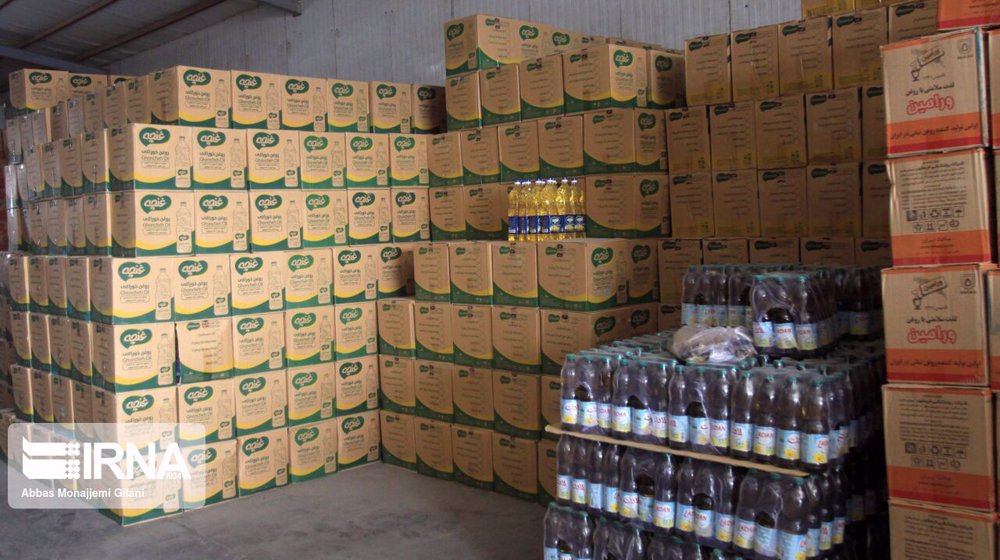 Iranian officials redistribute food seized from hoarders