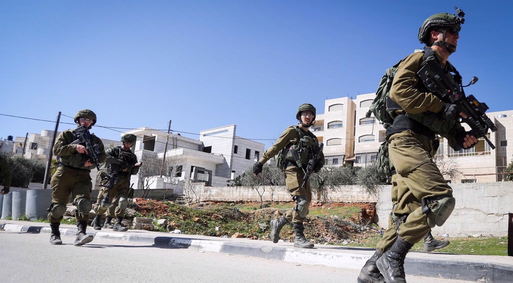 Palestinian teen shot dead in Israeli raid on occupied West Bank 